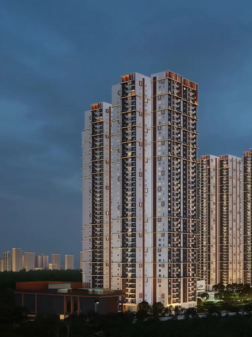 The towers of Aparna Moonstone lit at dusk
