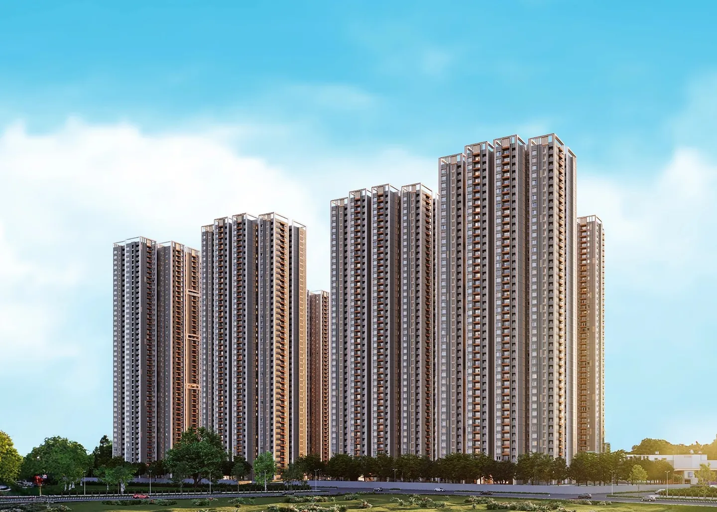 Tall apartment towers under a blue sky at Aparna Sunstone